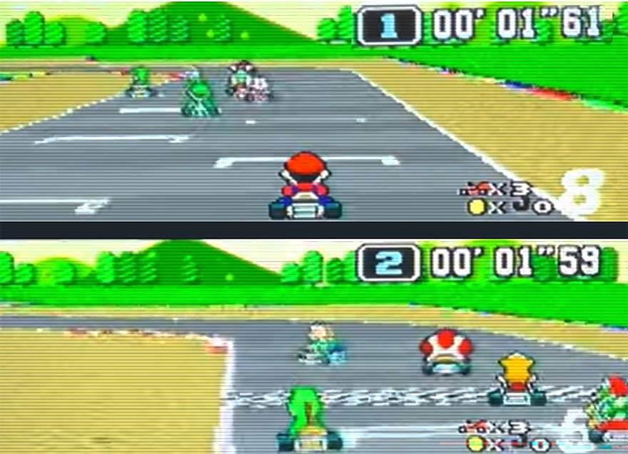 Split-screen multiplayer race in Super Mario Kart on the SNES